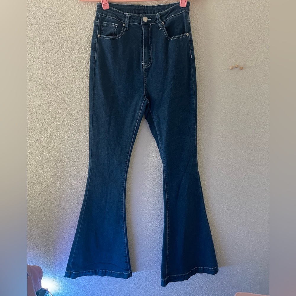 Flare blue jeans with heart pockets